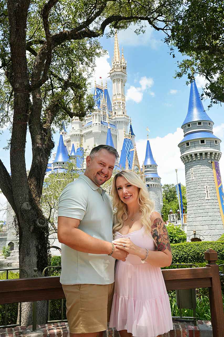 Krystal and Joseph in front of Cinderella Castle